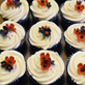 Cup cakes with red flowers